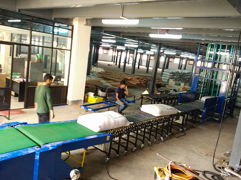 Bangladesh Tea Factory-flexible powered roller conveyor